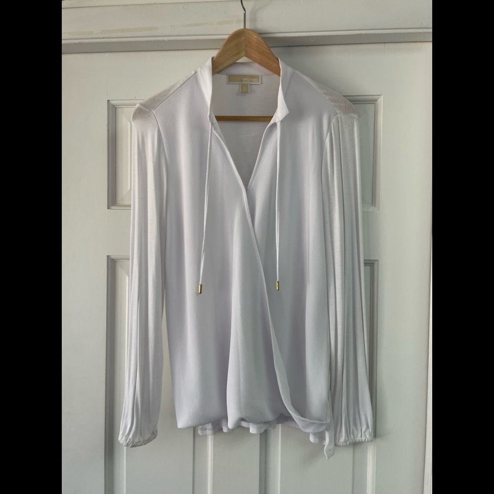 MK white t-shirt, dressy or casual.